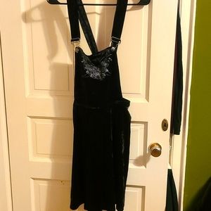 Black velvet overall dress with triple moon design